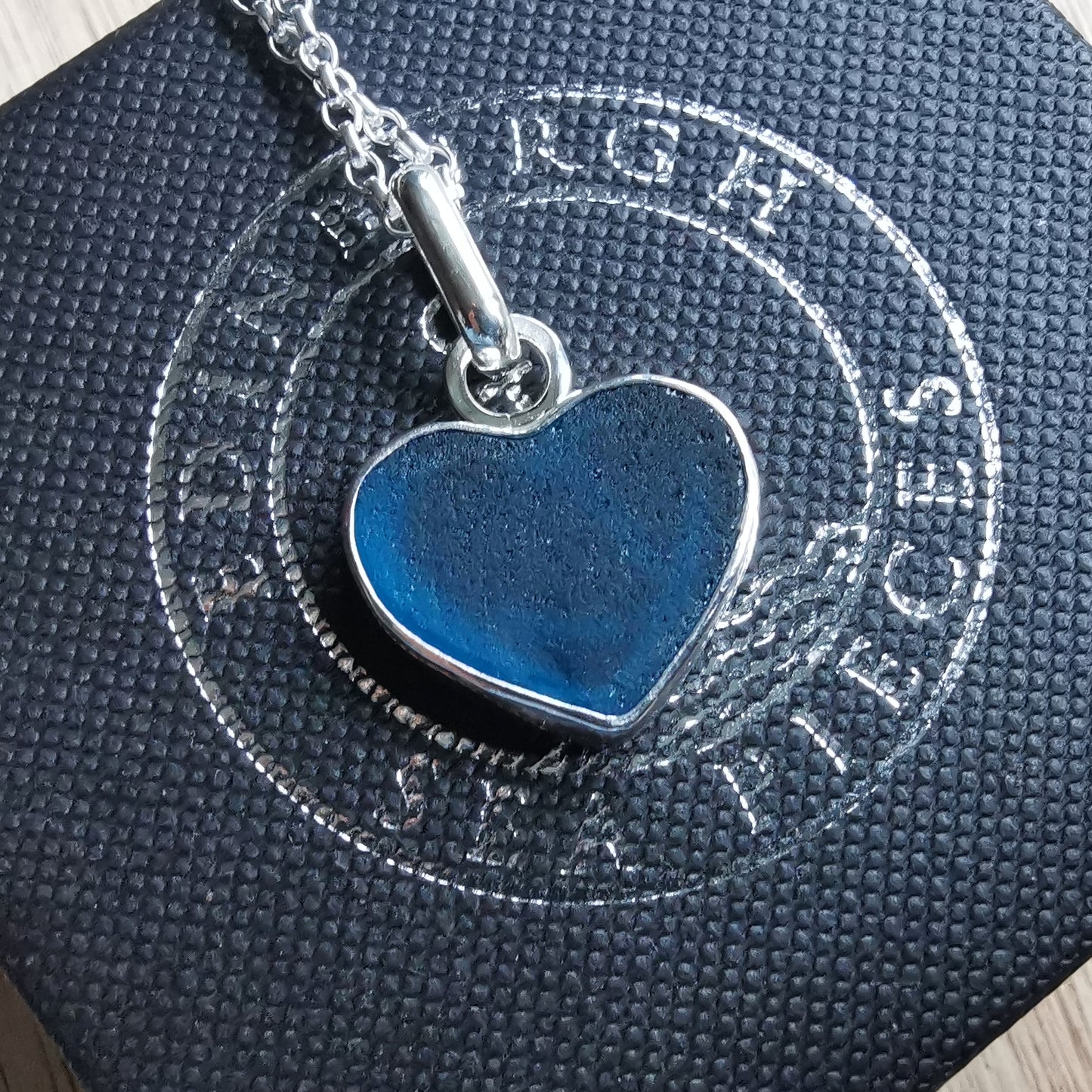 Reserved. Scottish teal blue sea glass heart & sterling silver pendant.