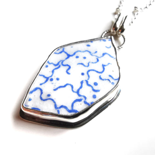 Scottish blue and white sea pottery & sterling silver pendant.