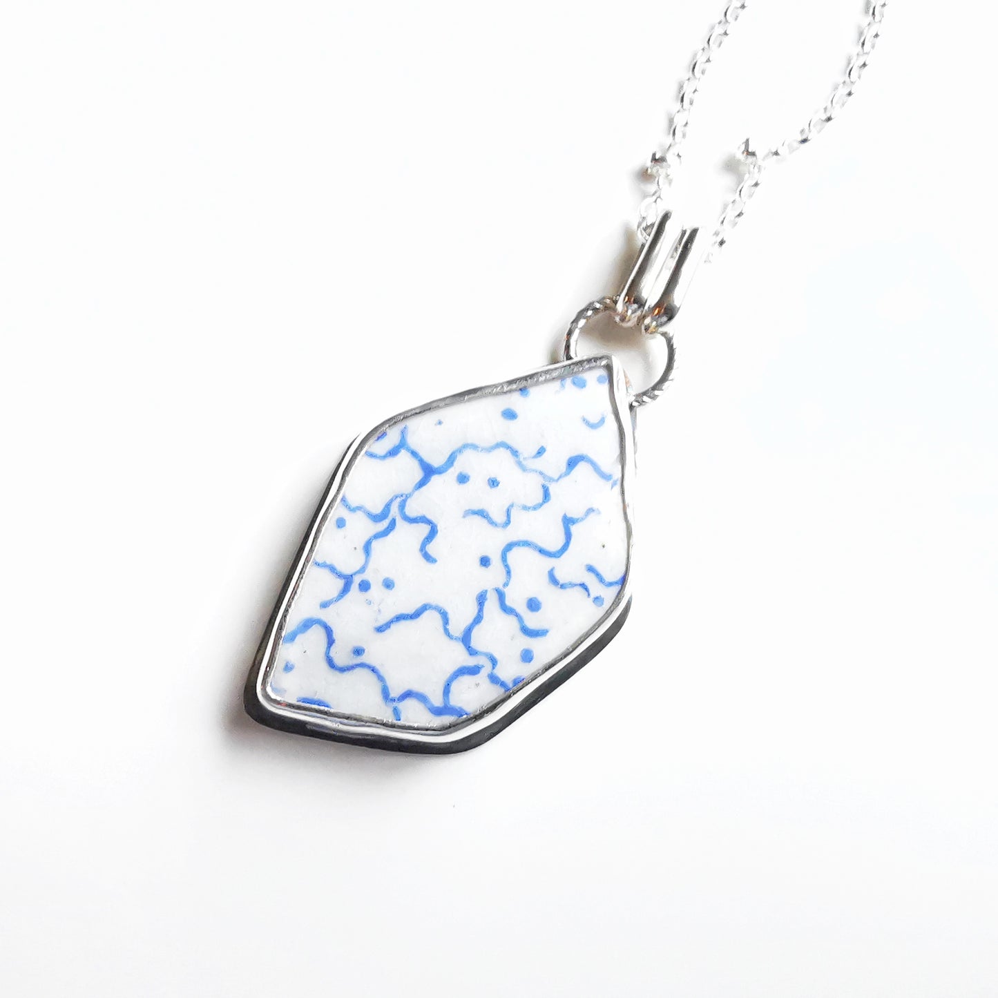 Scottish blue and white sea pottery & sterling silver pendant.