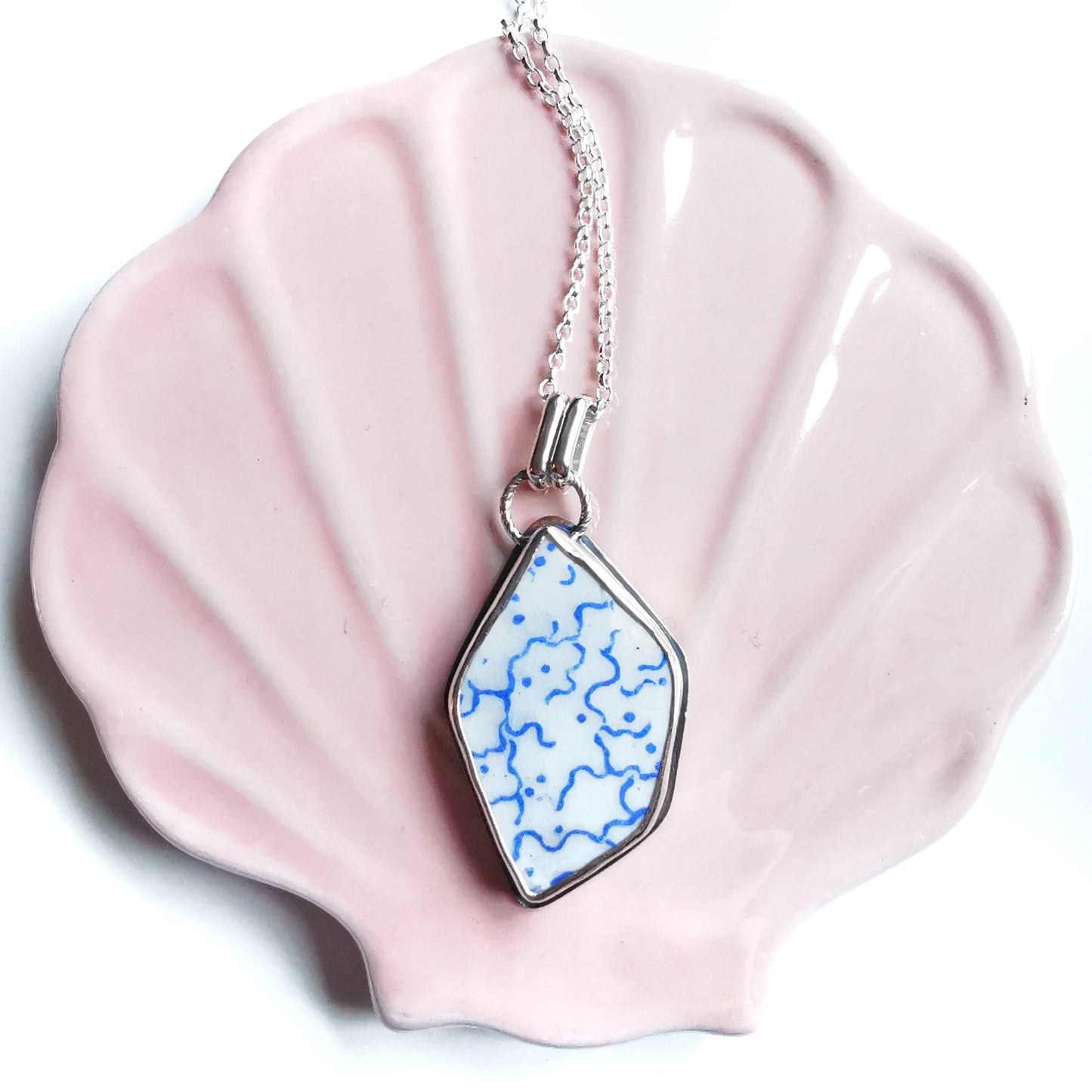 Scottish blue and white sea pottery & sterling silver pendant.