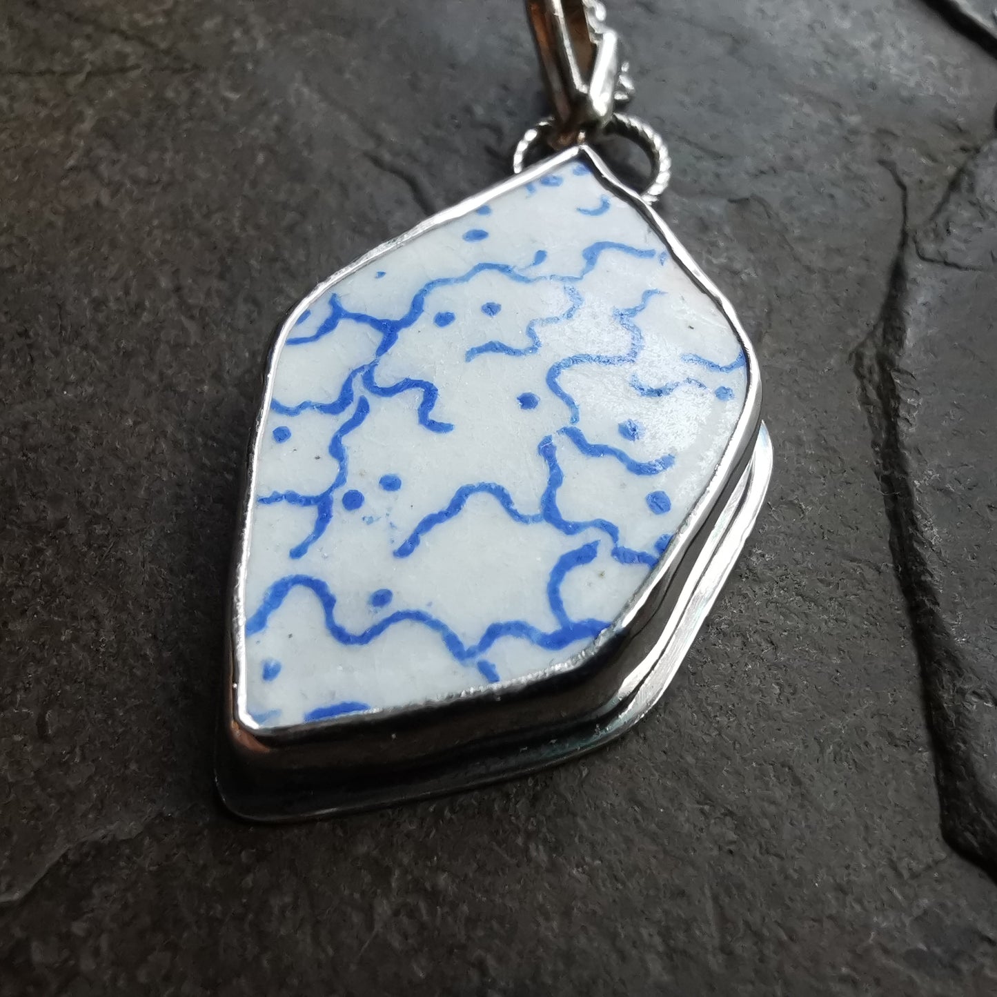 Scottish blue and white sea pottery & sterling silver pendant.