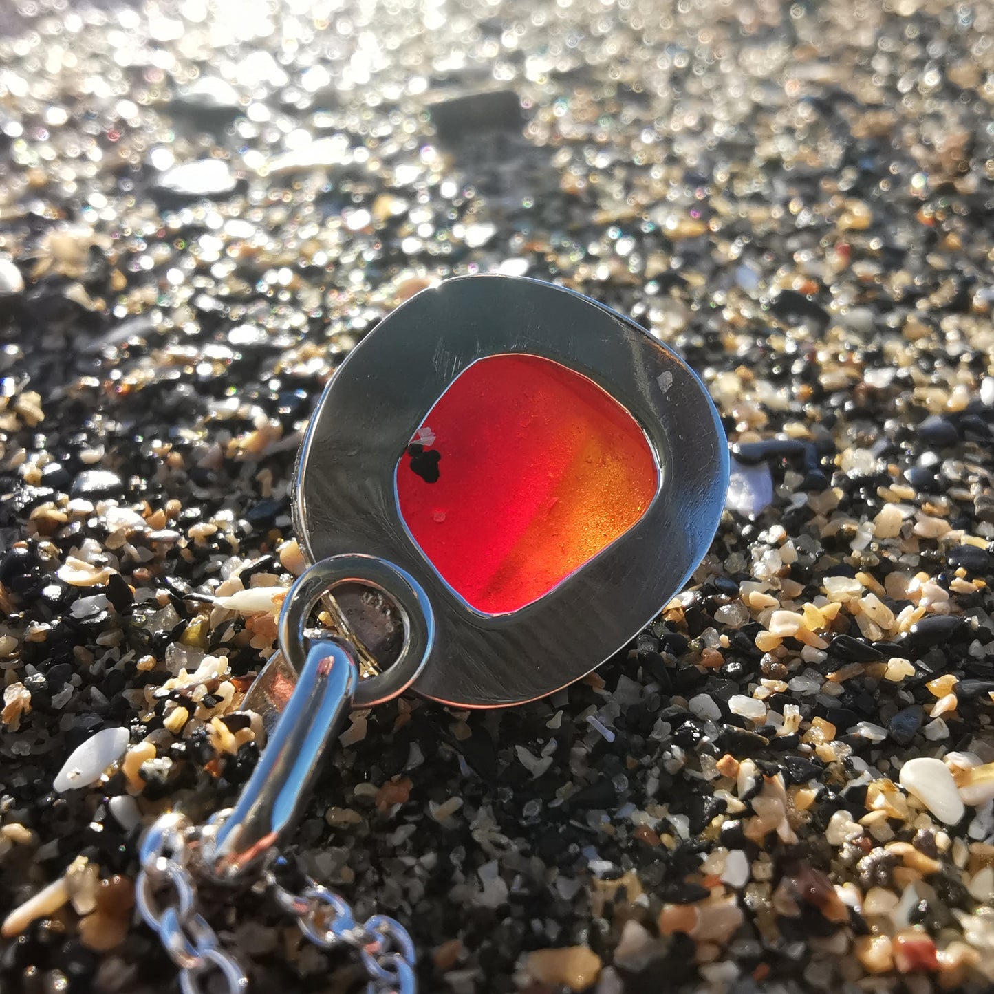 Red amberina sea glass & sterling silver pendant.