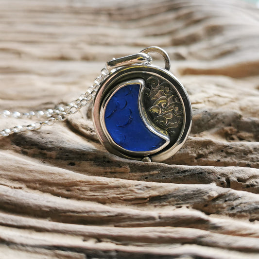 Cobalt blue crescent moon sea glass & sterling silver pendant.