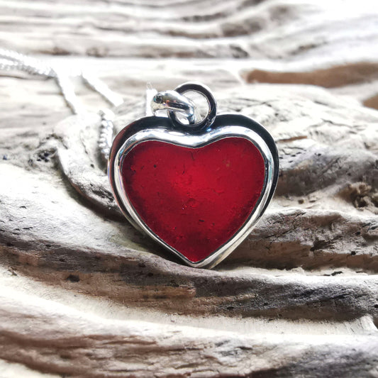 Burgundy red sea glass heart  & sterling silver pendant.