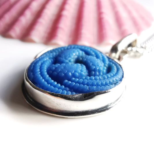 Vintage blue infinity knot sea glass button & sterling silver pendant.