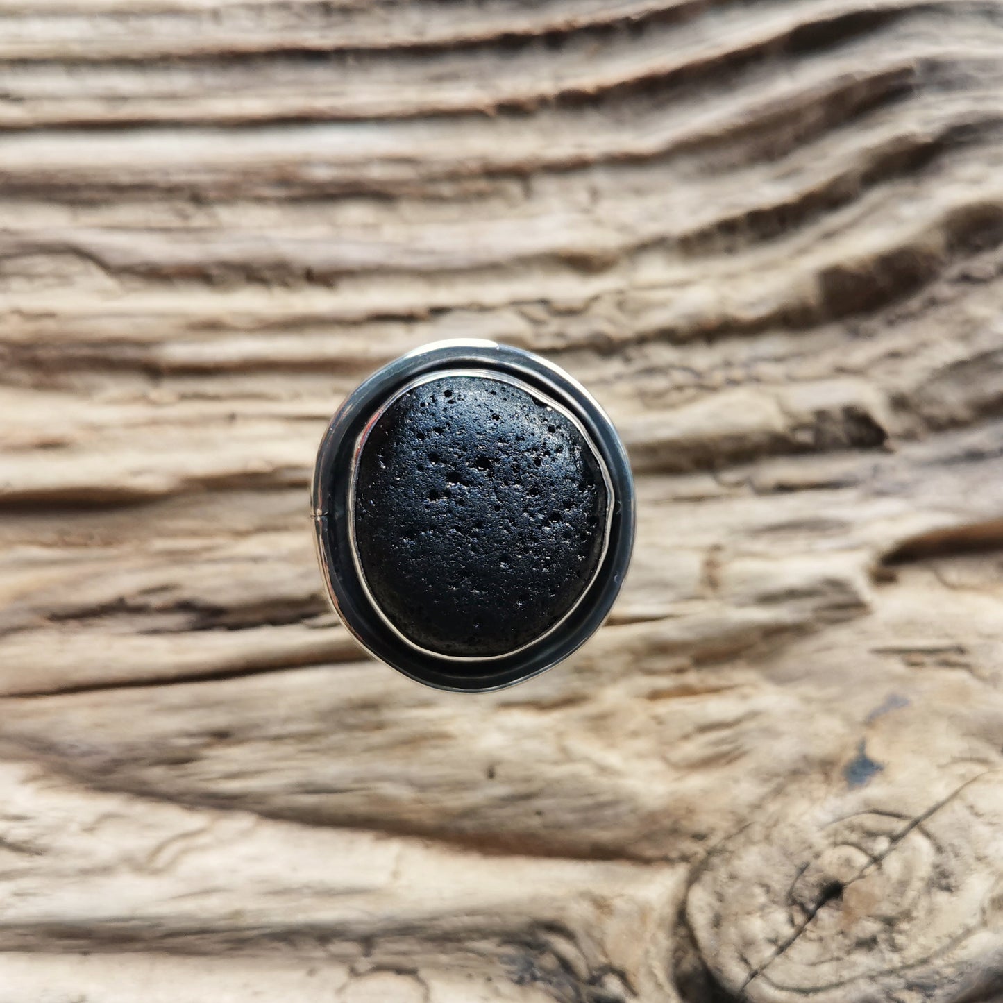 Black sea stone & sterling silver ring.