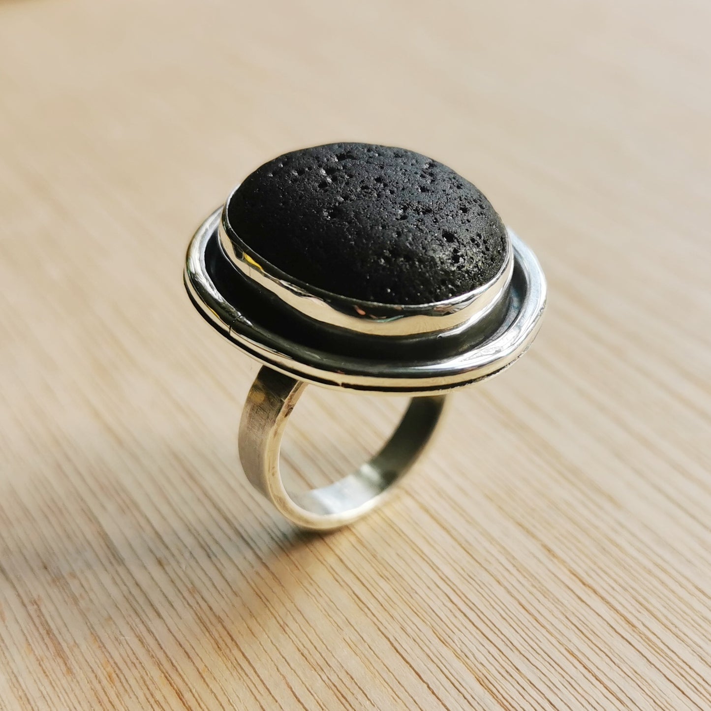 Black sea stone & sterling silver ring.