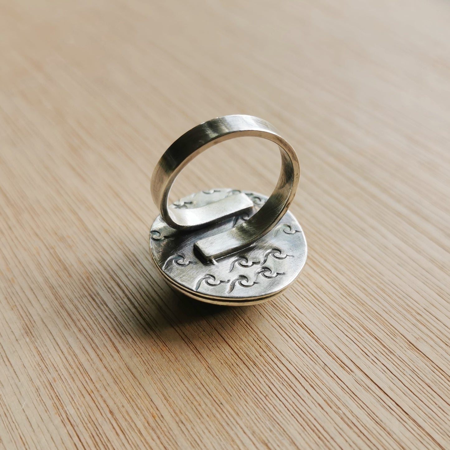 Black sea stone & sterling silver ring.