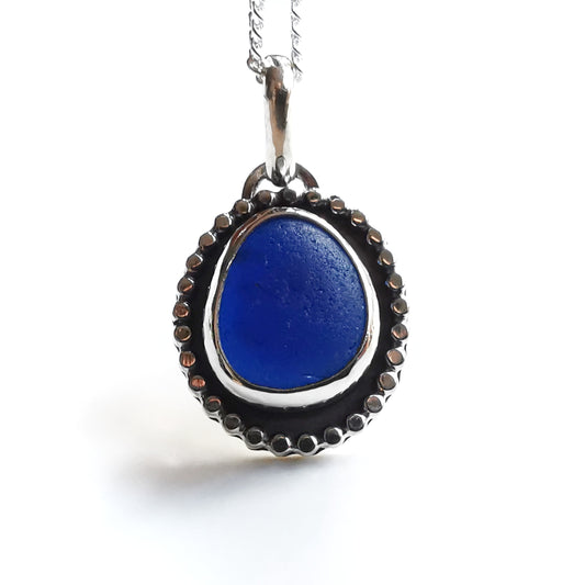 Cobalt blue sea glass & sterling silver pendant.