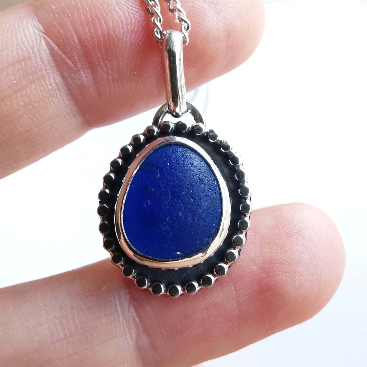 Cobalt blue sea glass & sterling silver pendant.