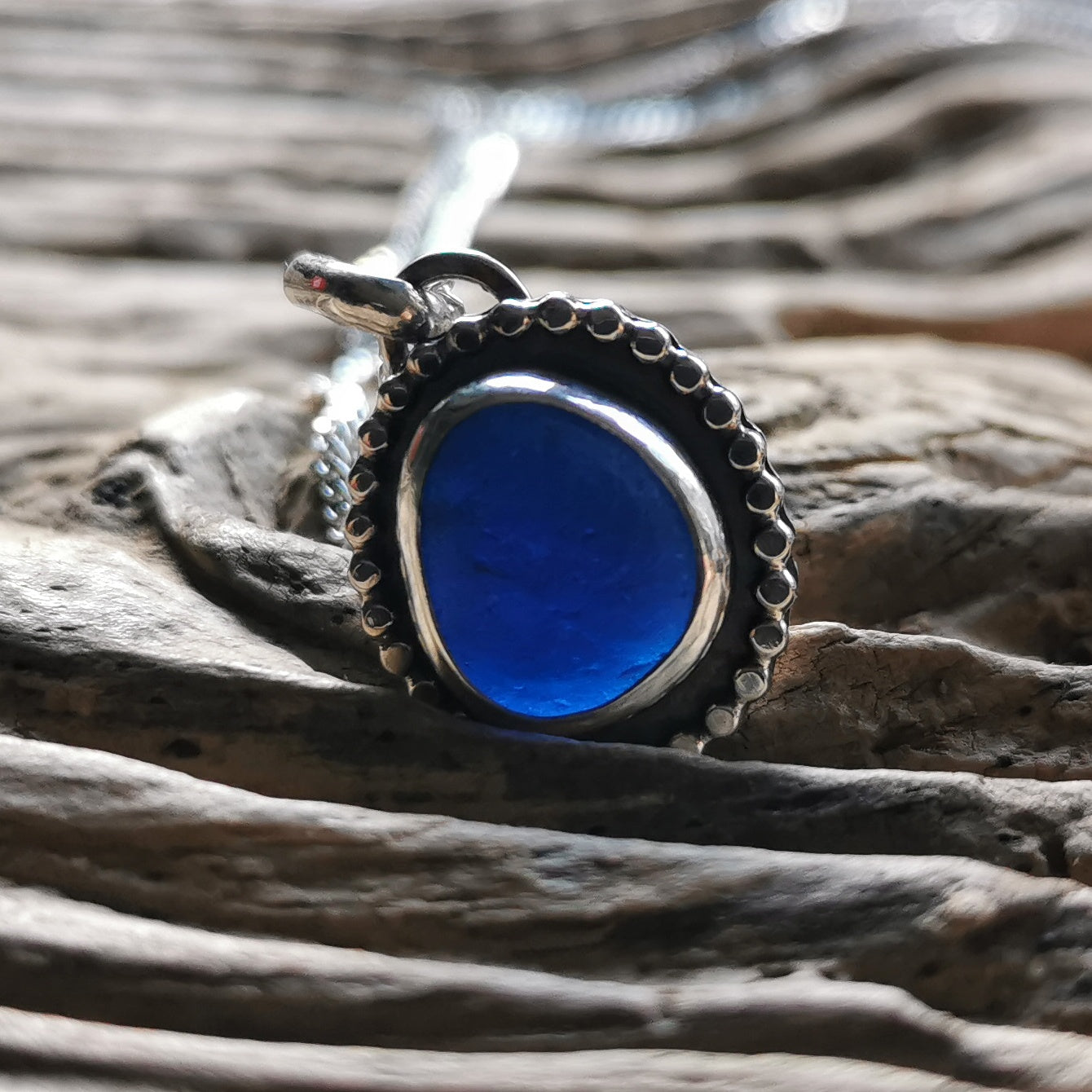 Cobalt blue sea glass & sterling silver pendant.