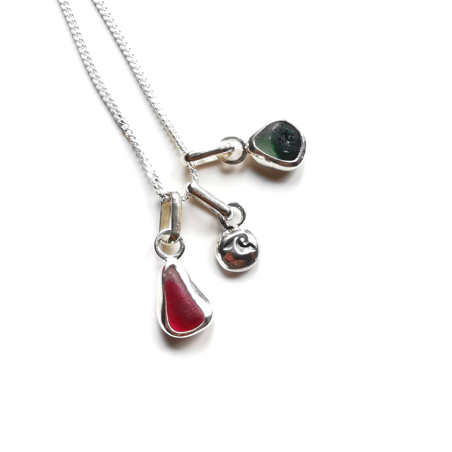 Tiny Seaham pink and green sea glass charms & sterling silver wave pebble trio.