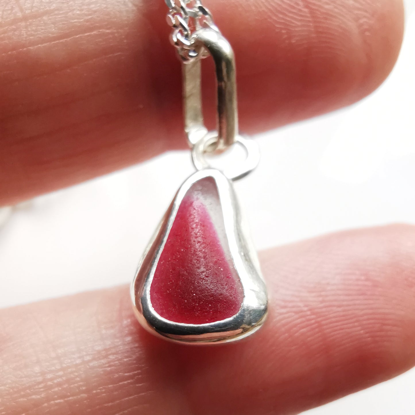 Tiny Seaham pink and green sea glass charms & sterling silver wave pebble trio.