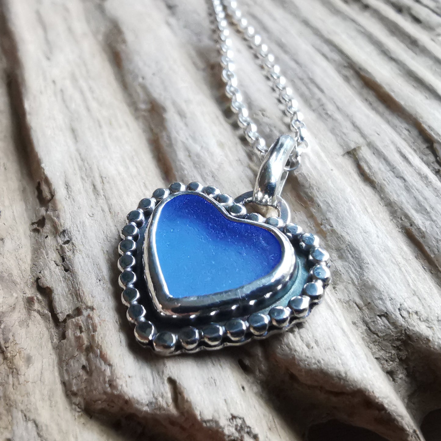 Scottish cornflower blue sea glass heart & sterling silver pendant.