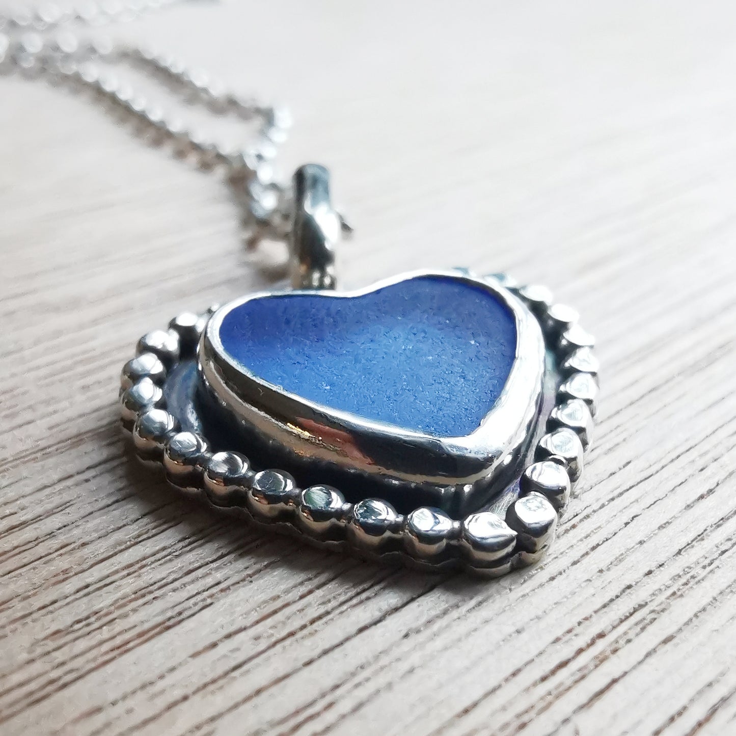 Scottish cornflower blue sea glass heart & sterling silver pendant.