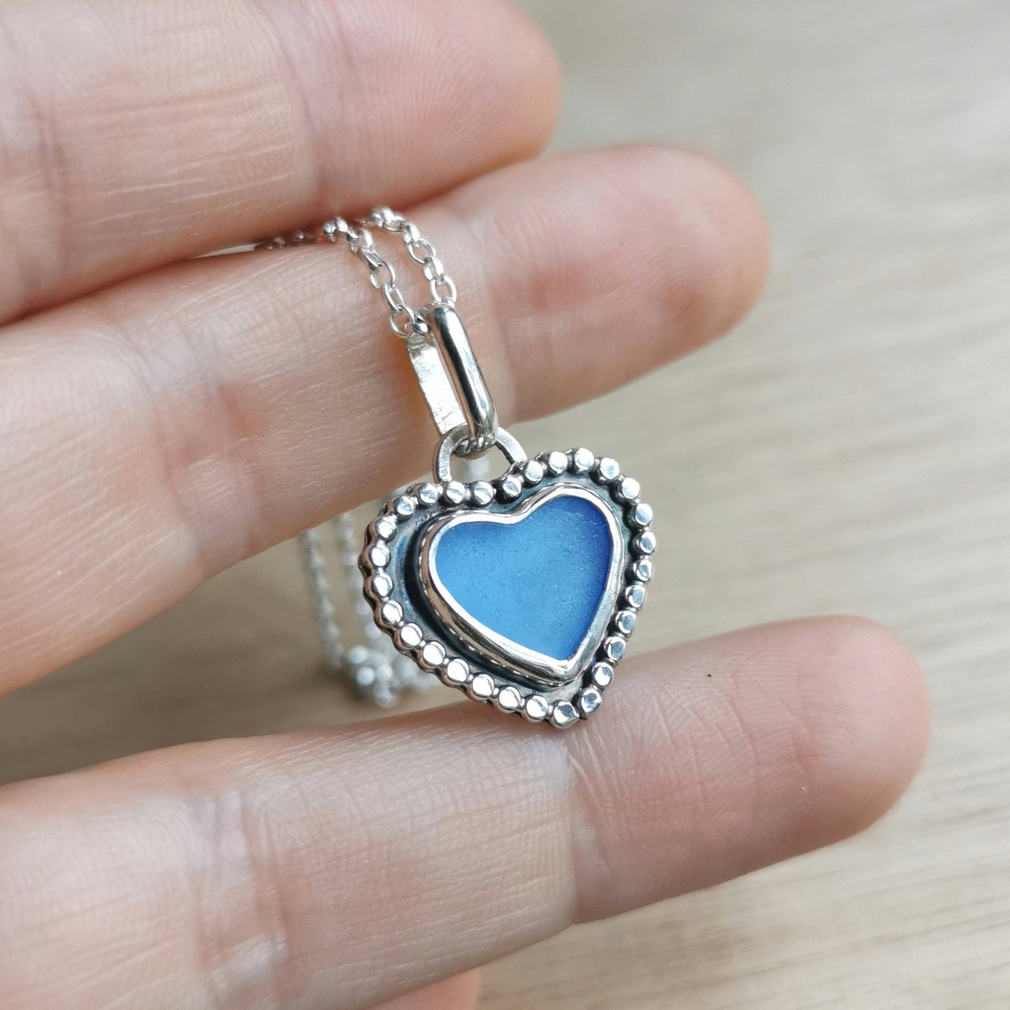 Scottish cornflower blue sea glass heart & sterling silver pendant.