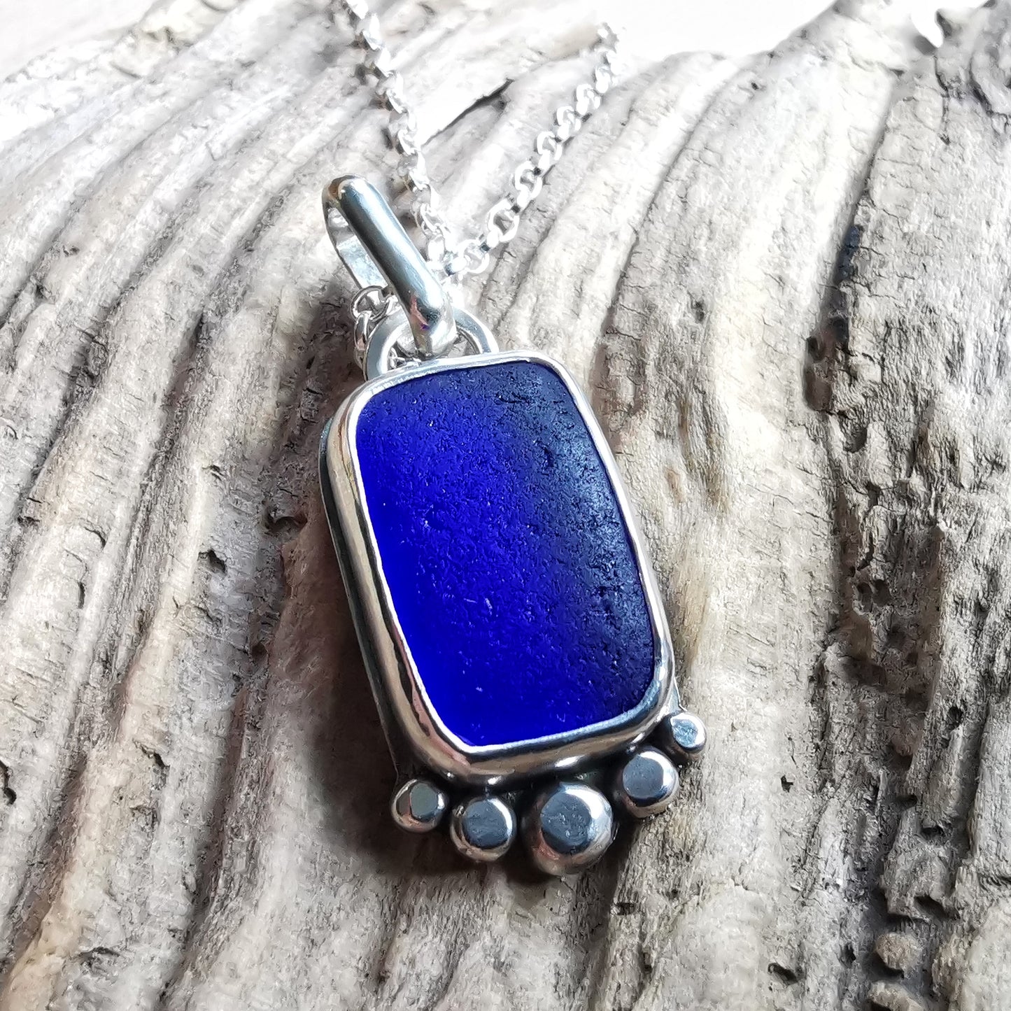 Cobalt blue 'vitamin sea' sea glass & sterling silver pendant.