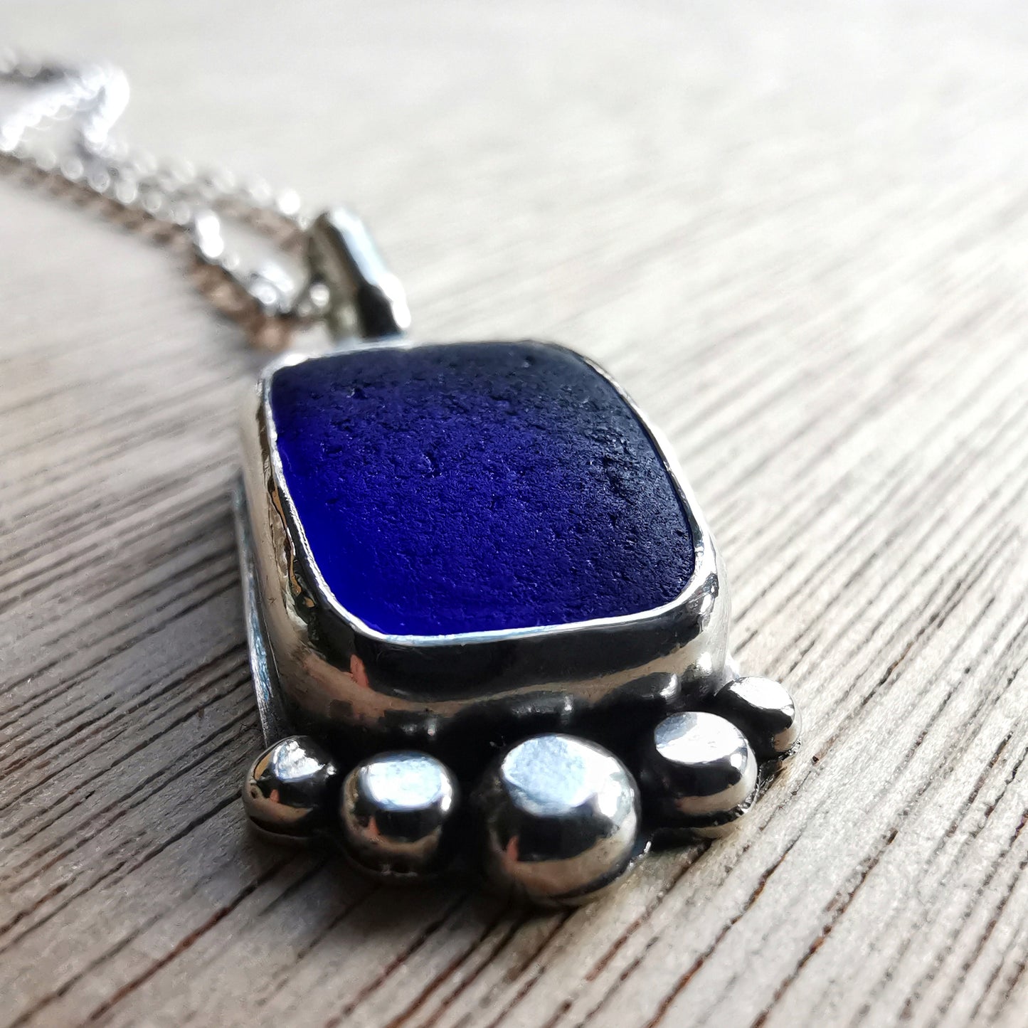 Cobalt blue 'vitamin sea' sea glass & sterling silver pendant.