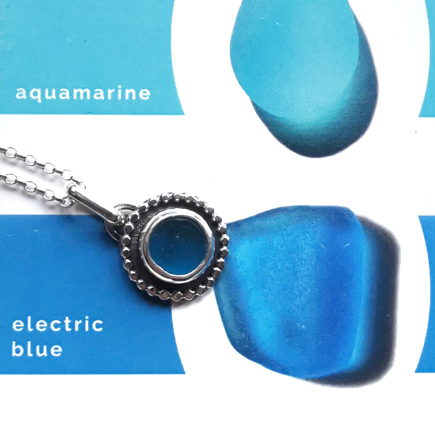 Electric blue sea glass & sterling silver pendant.