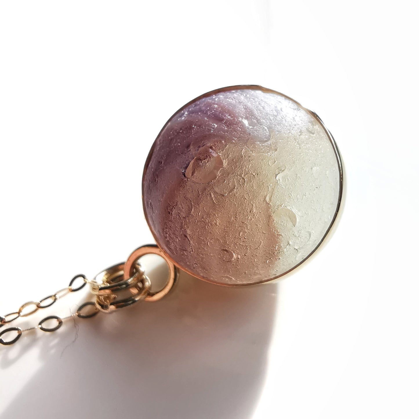 Genuine Scottish opalescent purple sea glass marble & 9 ct gold pendant.