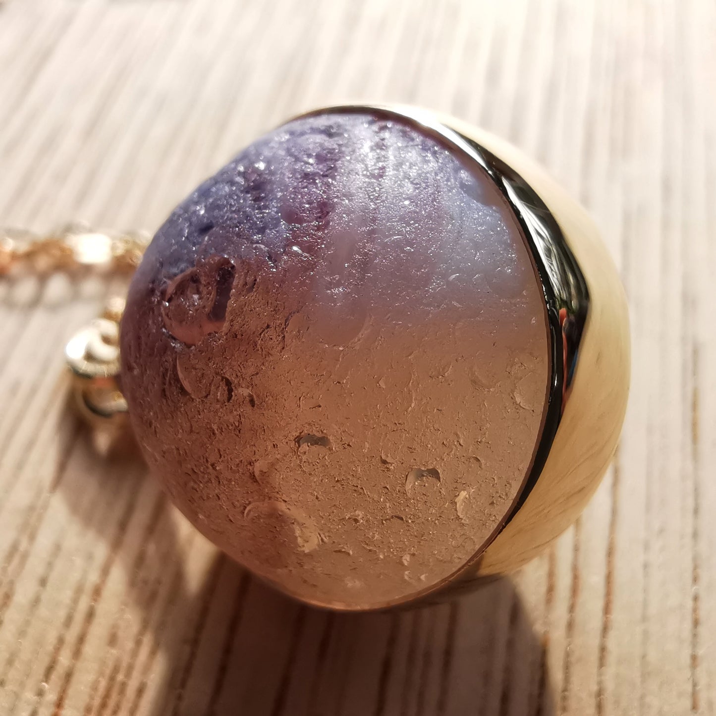 Genuine Scottish opalescent purple sea glass marble & 9 ct gold pendant.