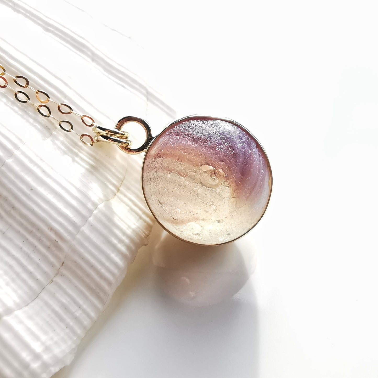 Genuine Scottish opalescent purple sea glass marble & 9 ct gold pendant.