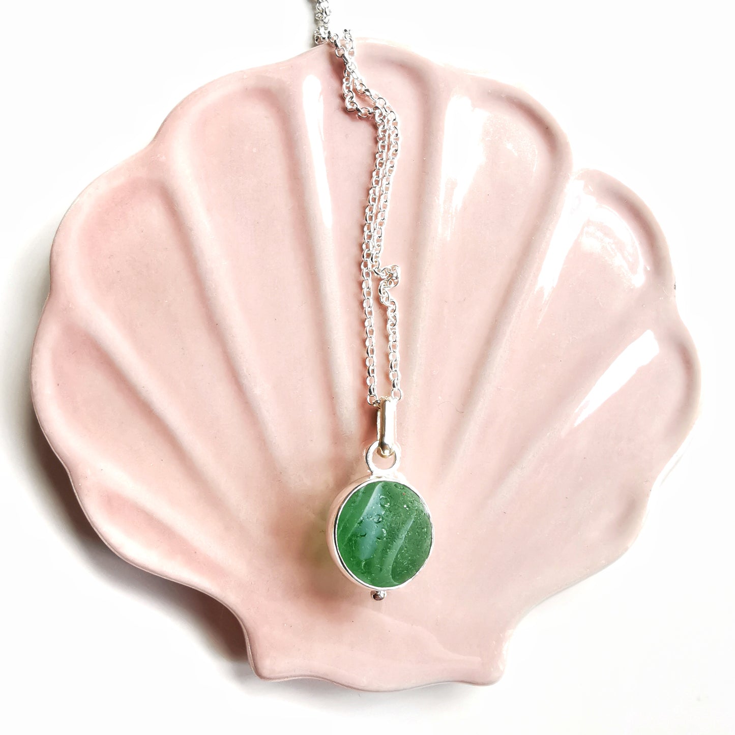 Genuine green sea glass marble & sterling silver pendant.