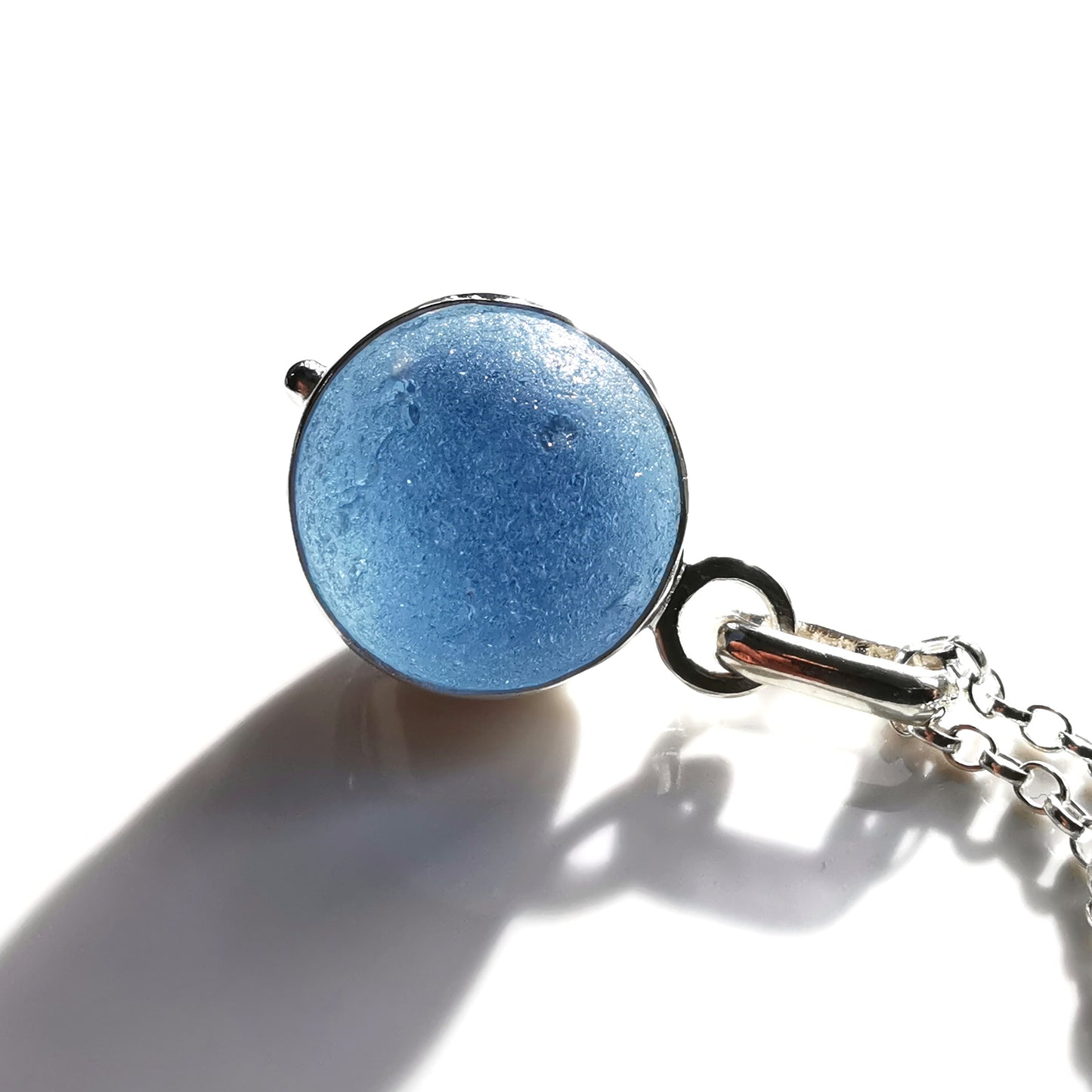 Scottish blue sea glass marble & sterling silver pendant.