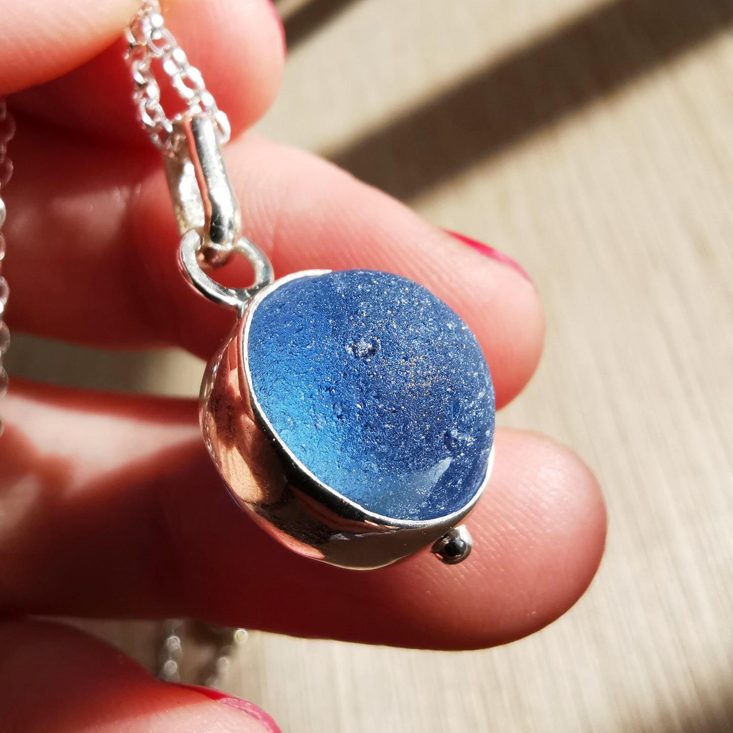 Scottish blue sea glass marble & sterling silver pendant.