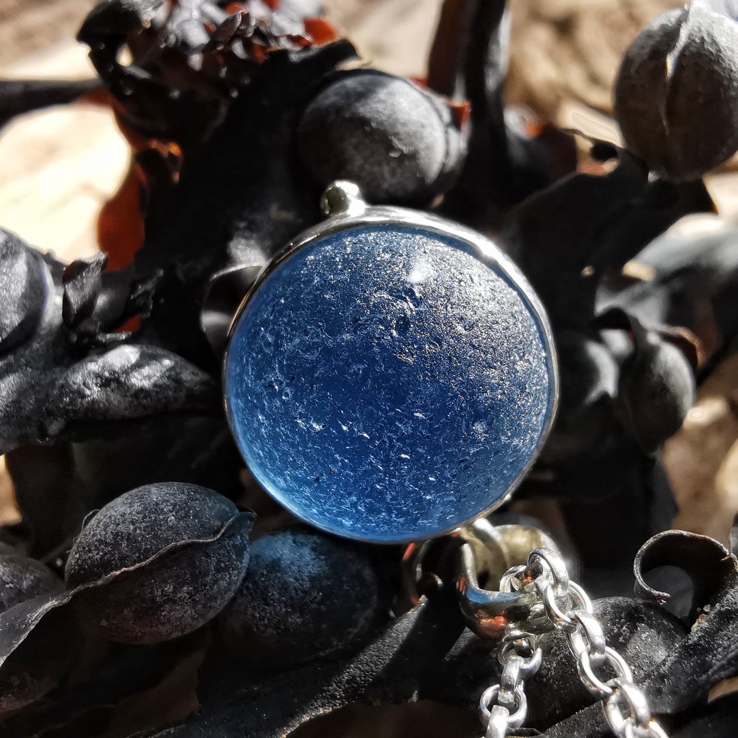 Scottish blue sea glass marble & sterling silver pendant.