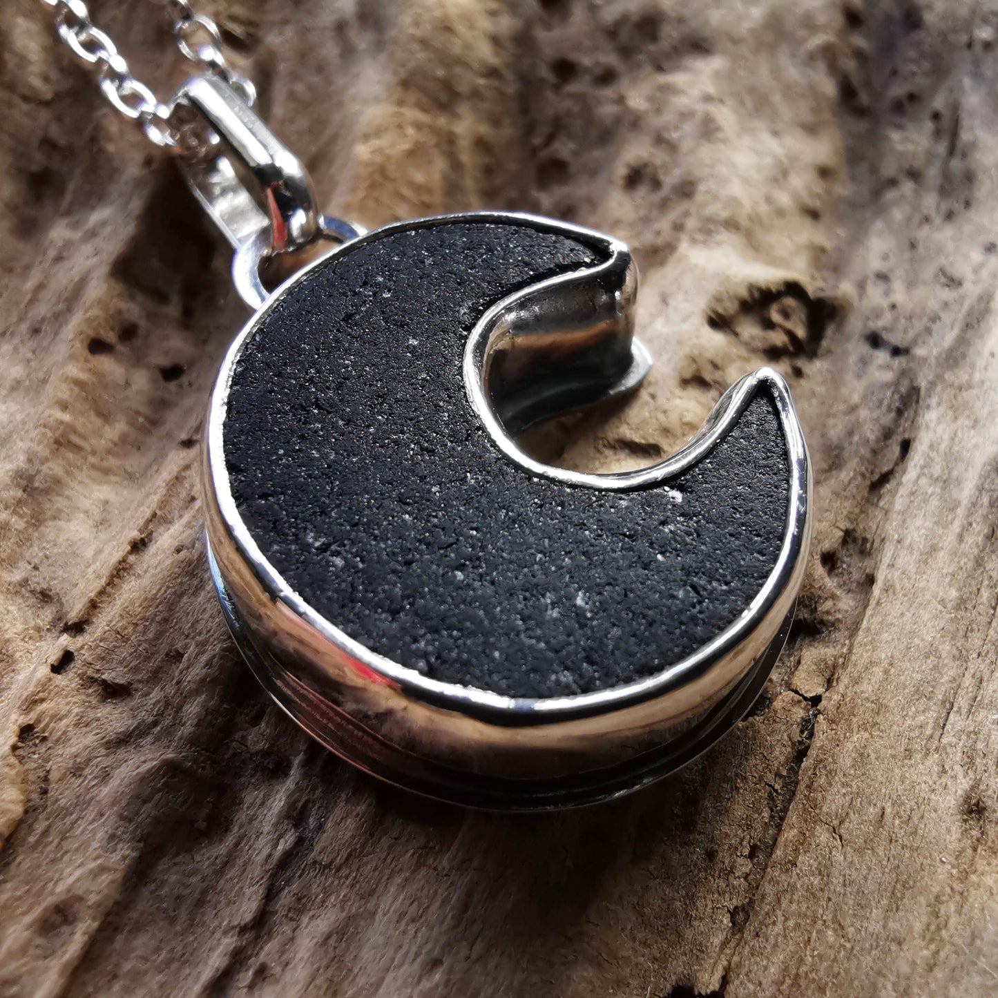 Scottish black crescent moon sea glass & sterling silver pendant.