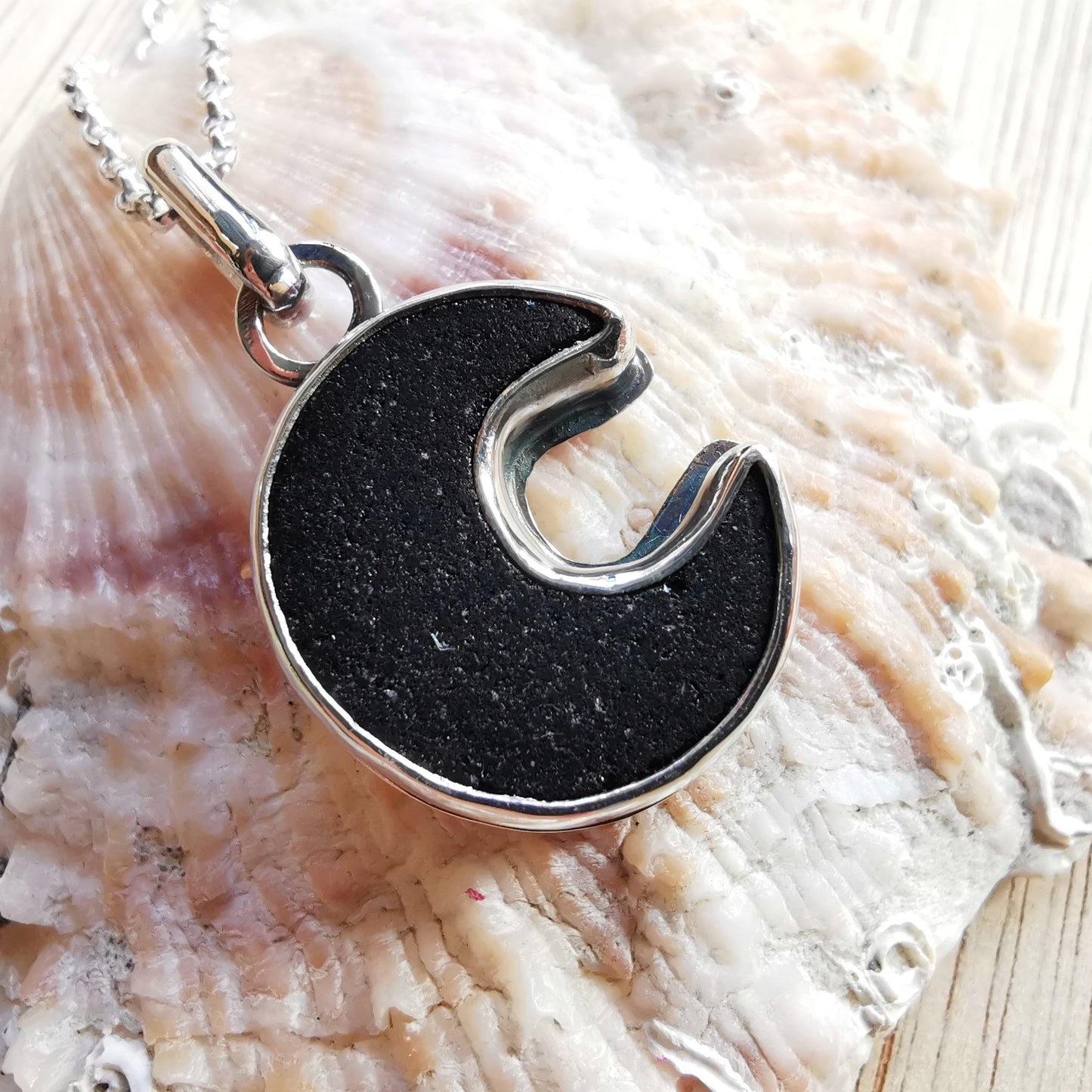 Scottish black crescent moon sea glass & sterling silver pendant.