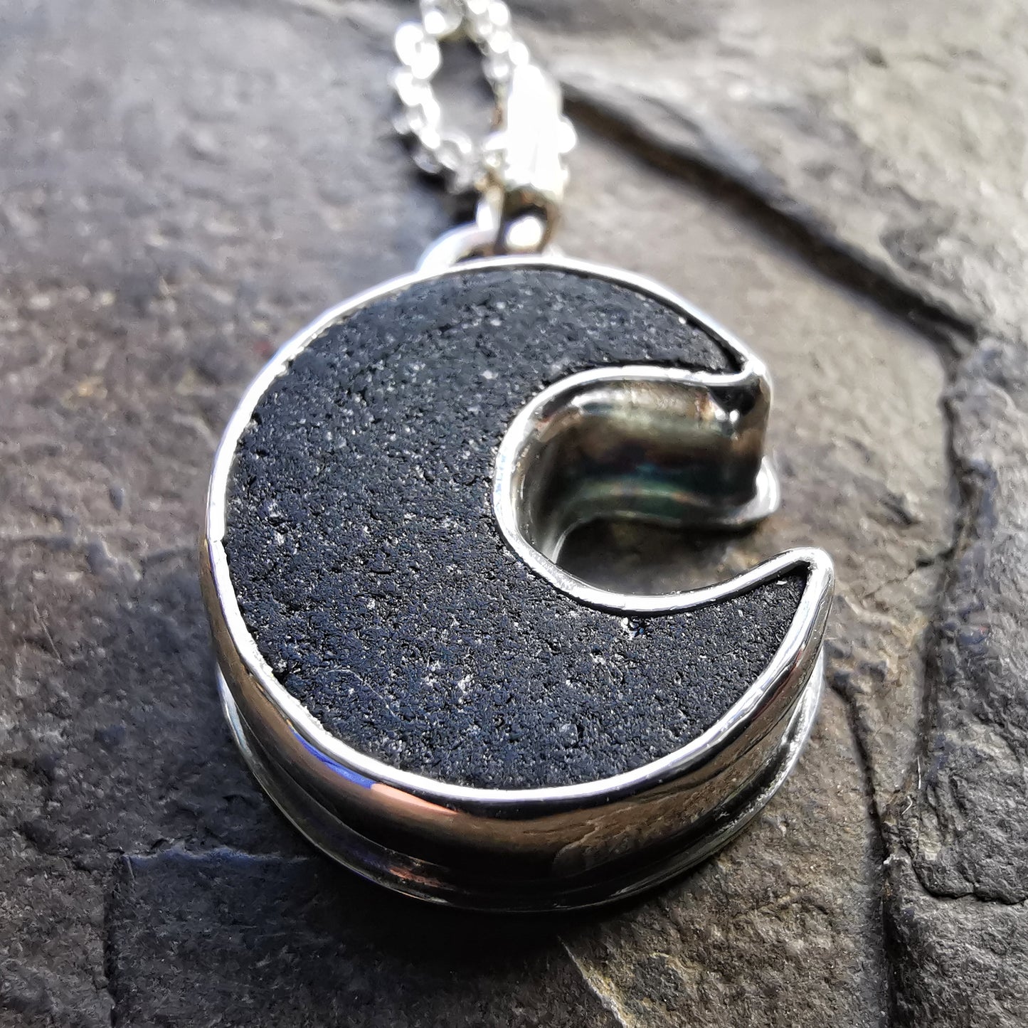 Scottish black crescent moon sea glass & sterling silver pendant.