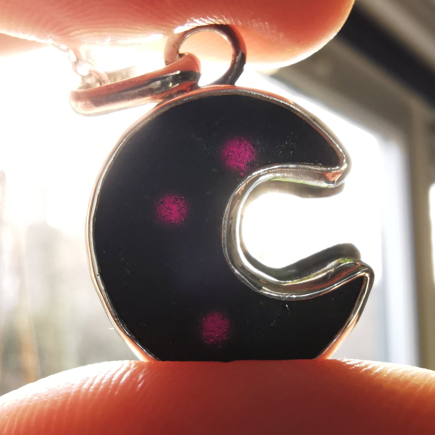 Scottish black crescent moon sea glass & sterling silver pendant.