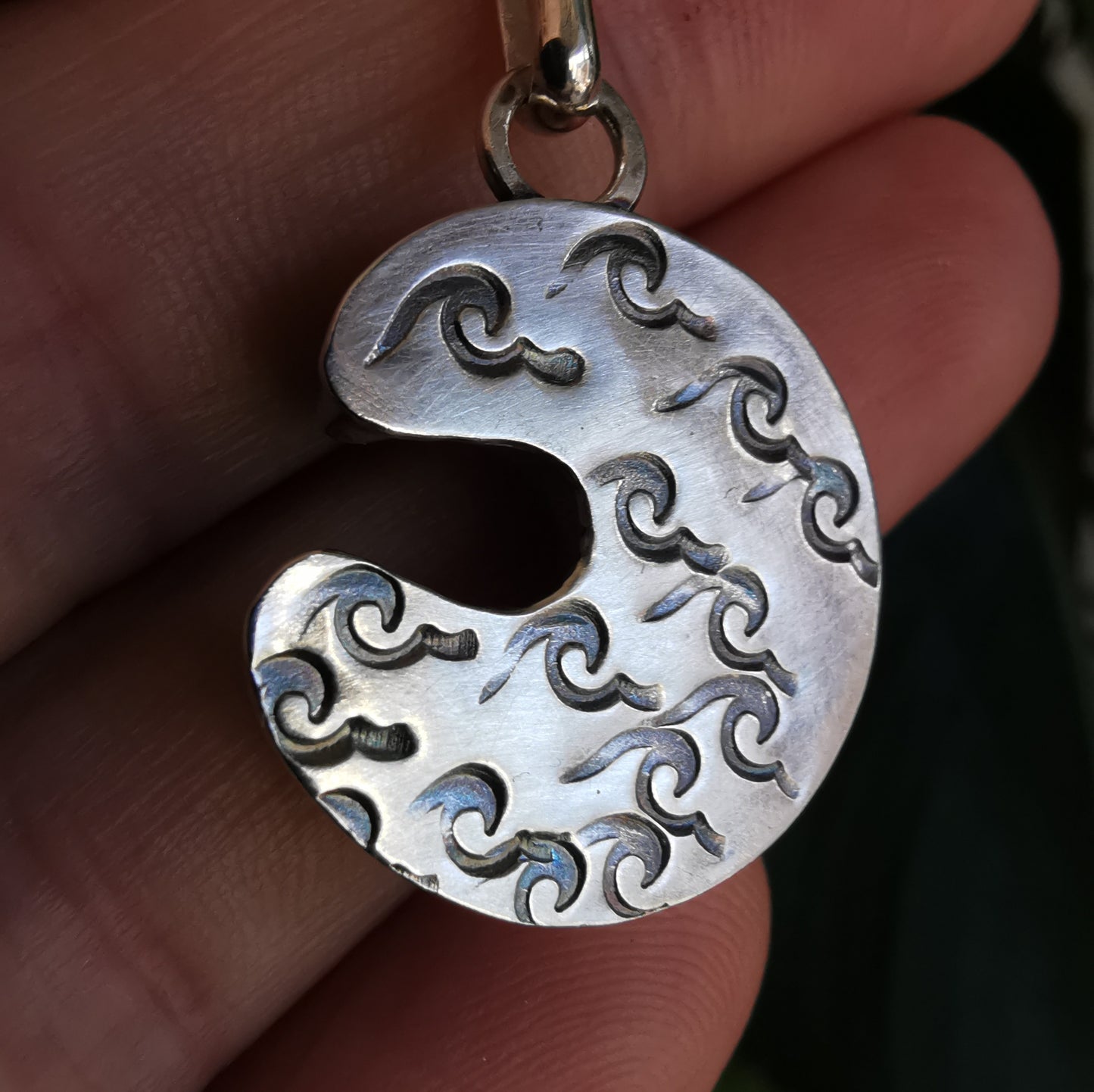 Opalescent crescent moon sea glass & sterling silver pendant.