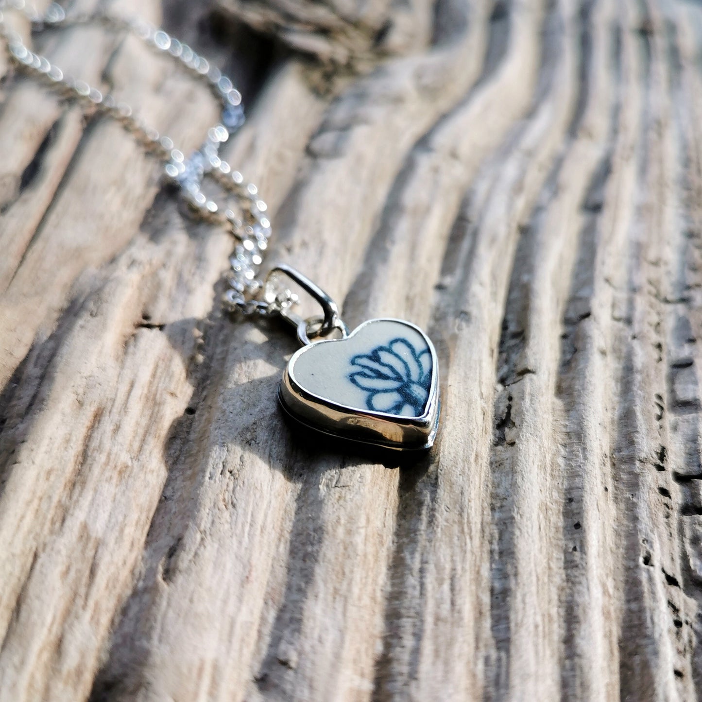 Scottish flower sea pottery heart & sterling silver pendant.