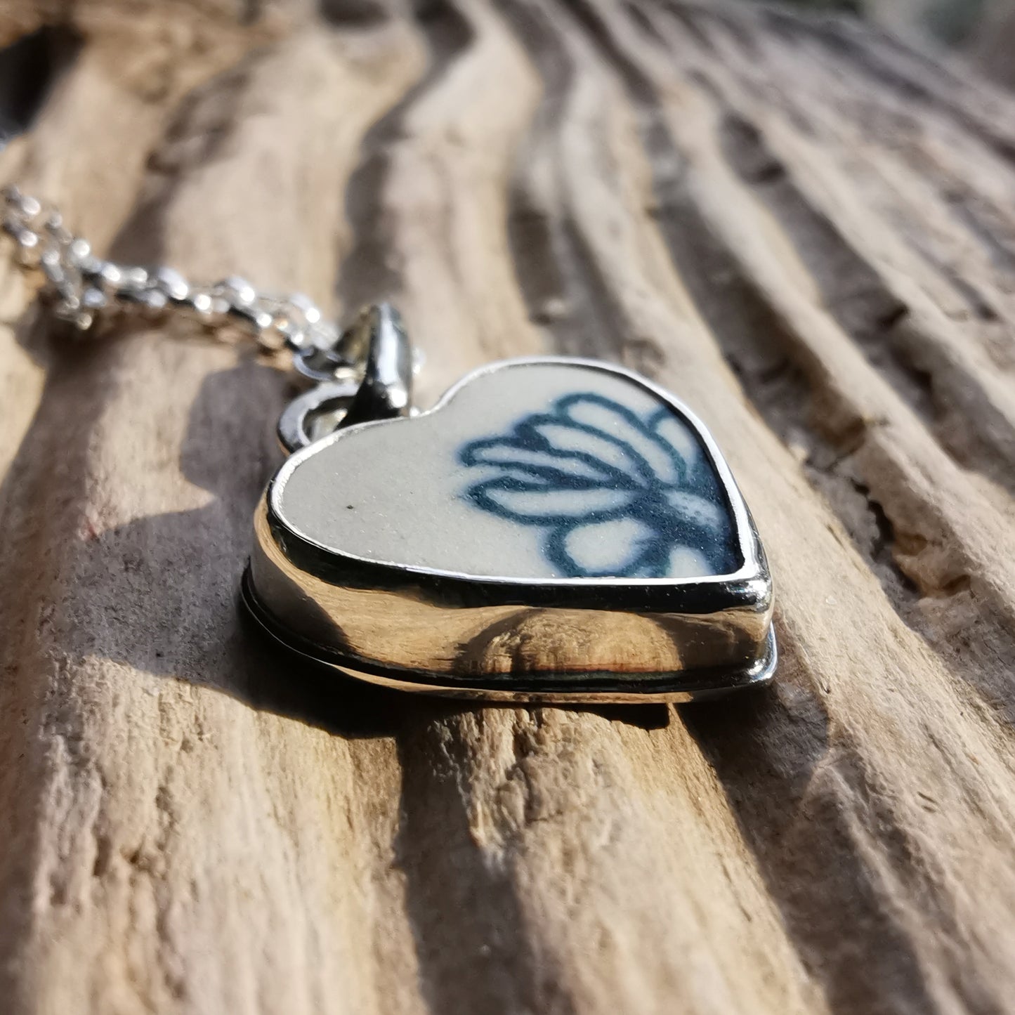 Scottish flower sea pottery heart & sterling silver pendant.