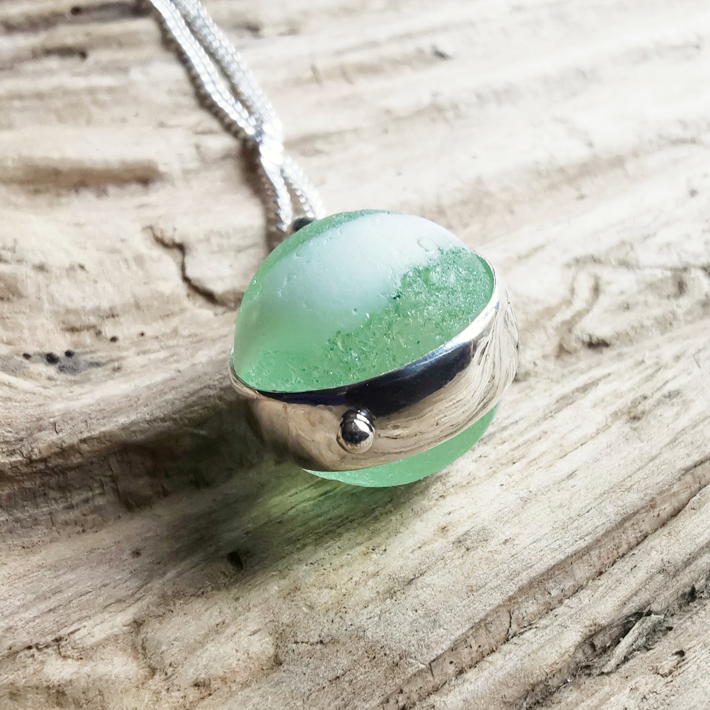 Scottish green and white sea glass marble & sterling silver pendant.