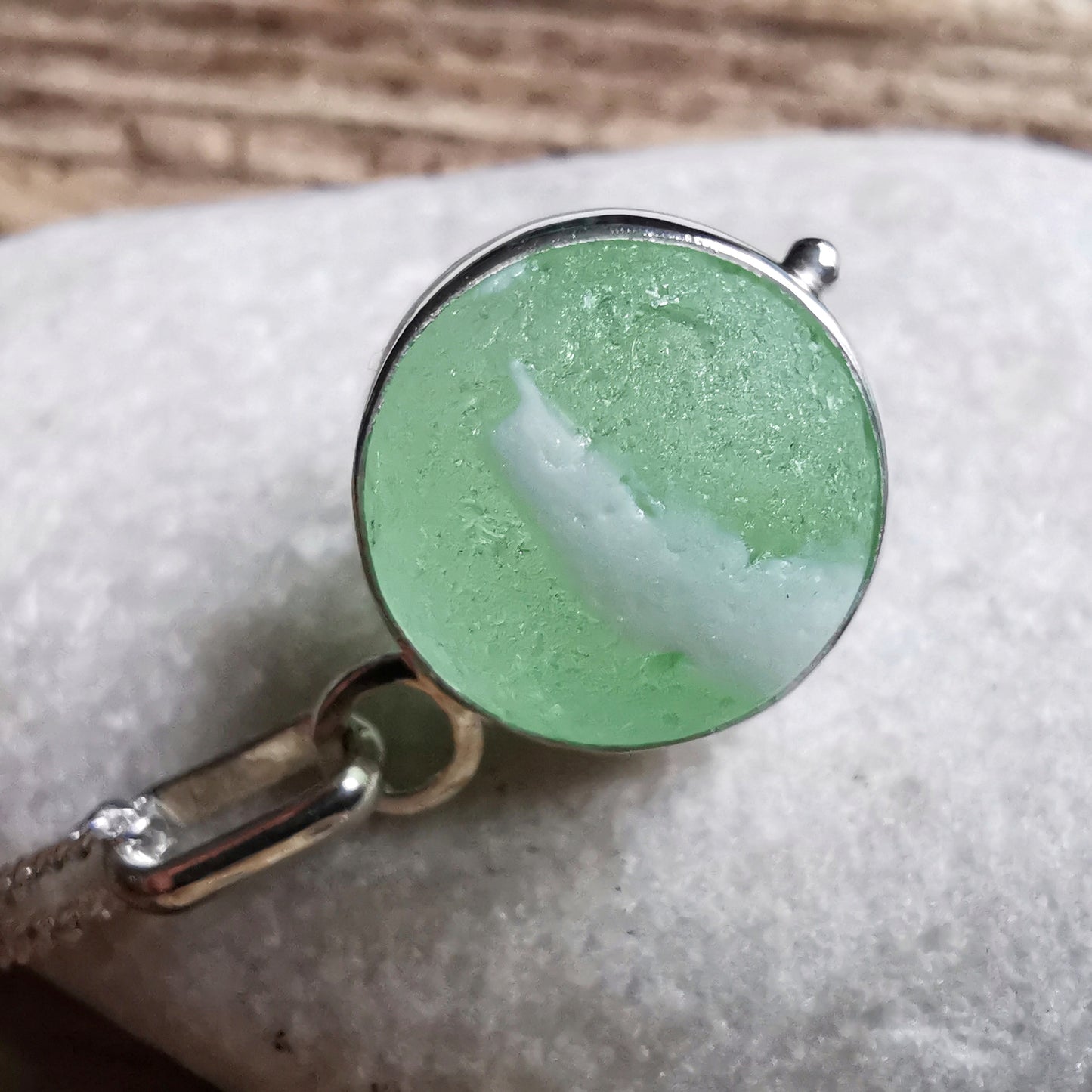 Scottish green and white sea glass marble & sterling silver pendant.