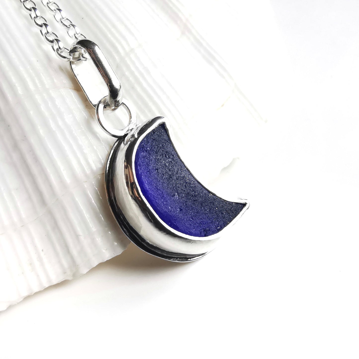 Scottish blue crescent moon sea glass & sterling silver pendant.