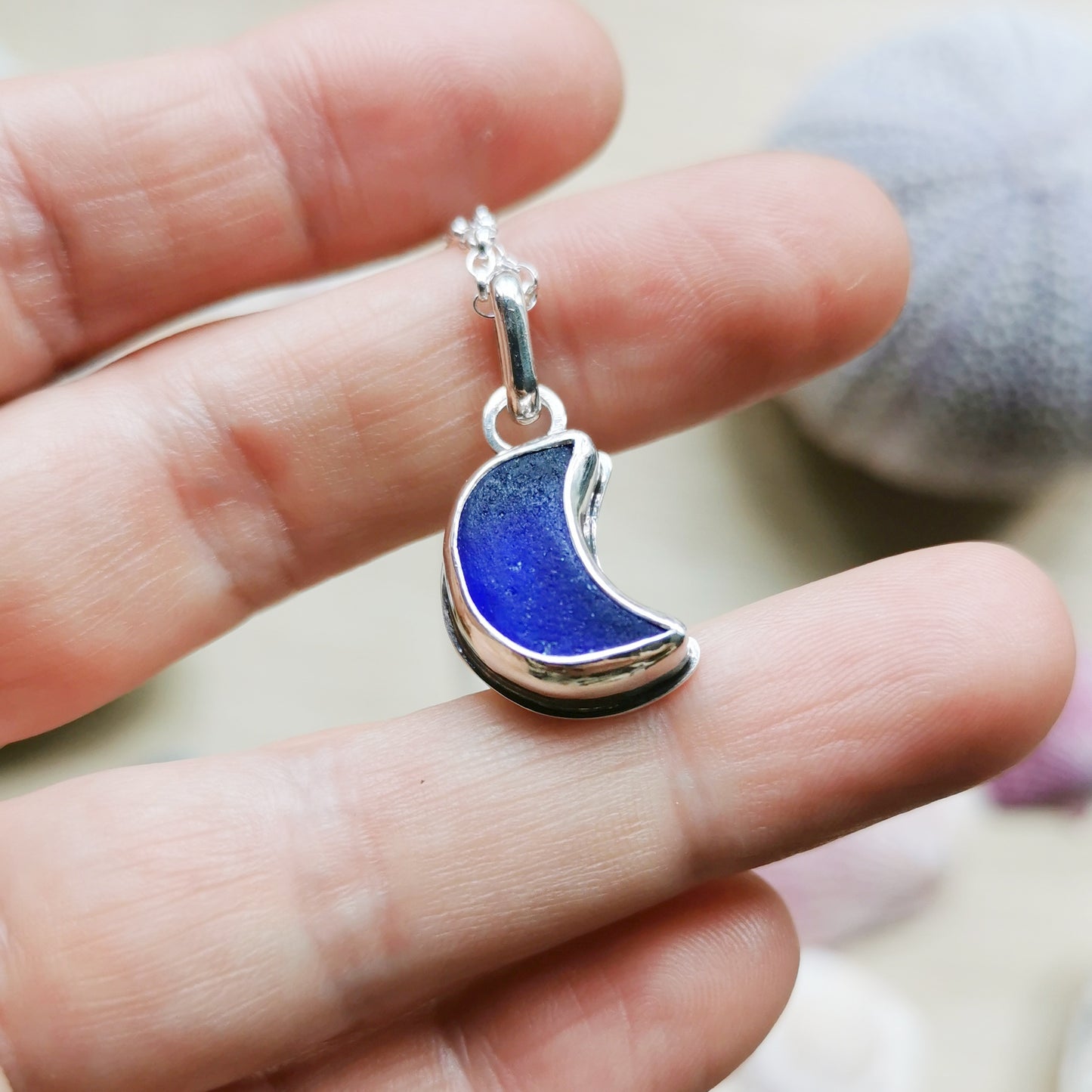 Scottish blue crescent moon sea glass & sterling silver pendant.