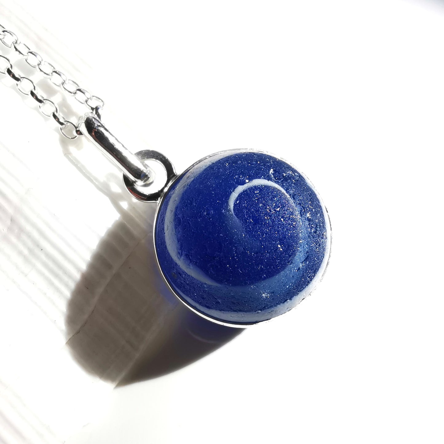 Scottish cobalt blue and white sea glass marble & sterling silver pendant.