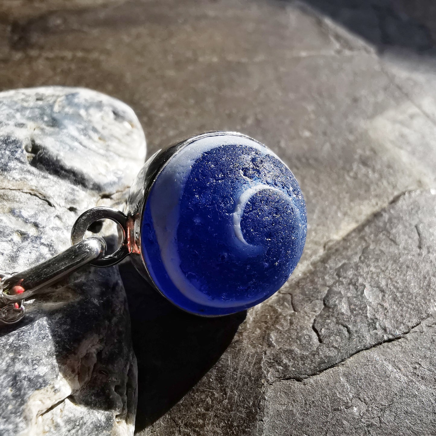 Scottish cobalt blue and white sea glass marble & sterling silver pendant.