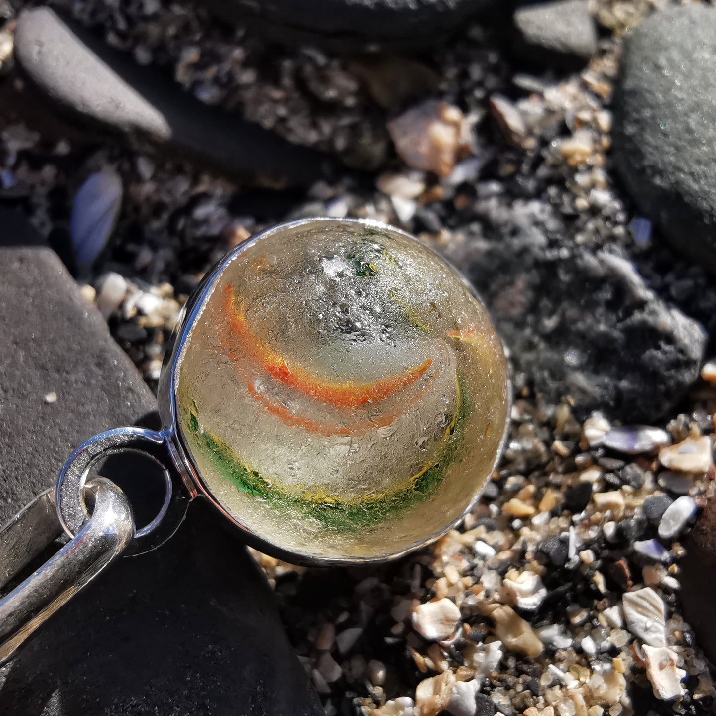 Hand made German sea glass marble & sterling silver pendant.