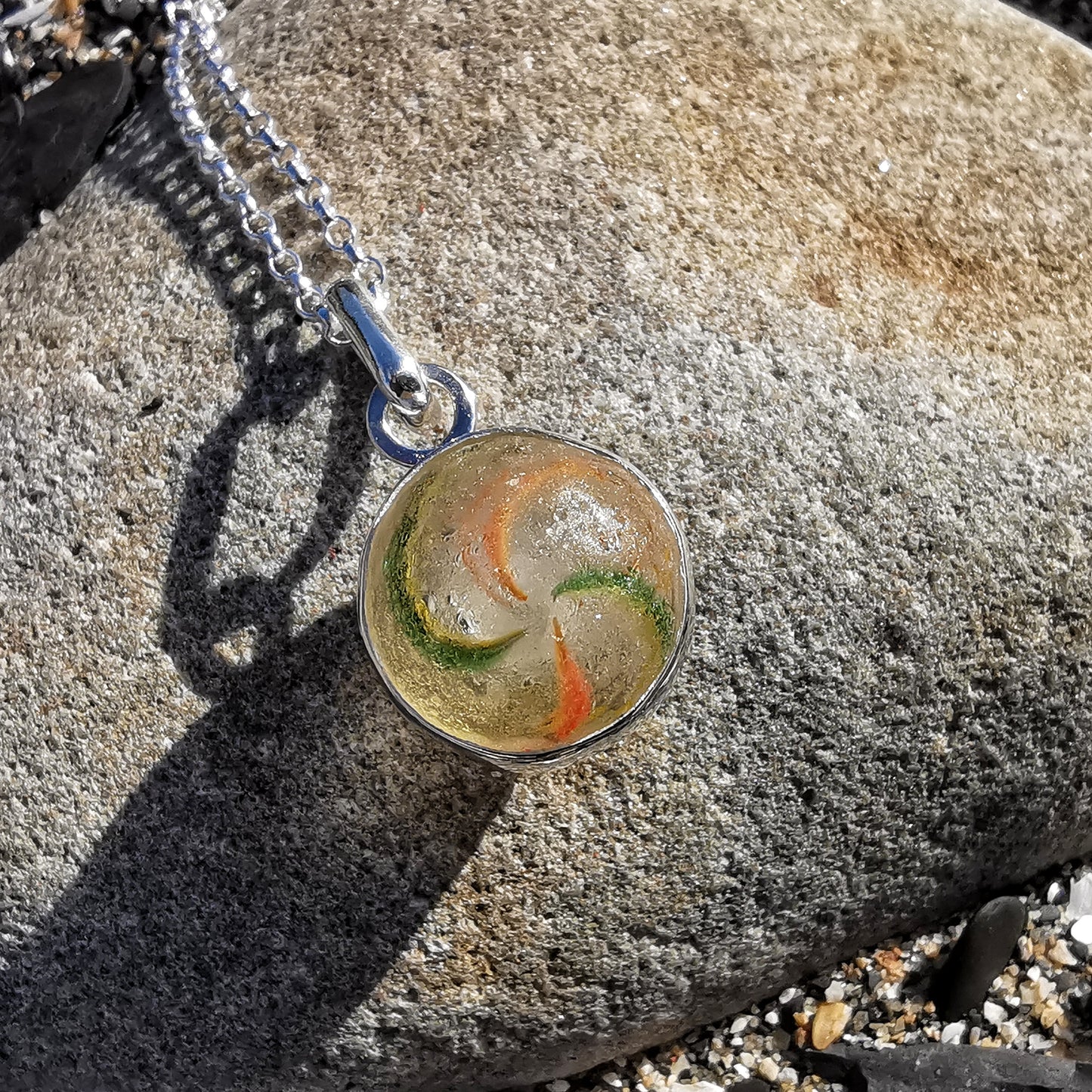 Hand made German sea glass marble & sterling silver pendant.