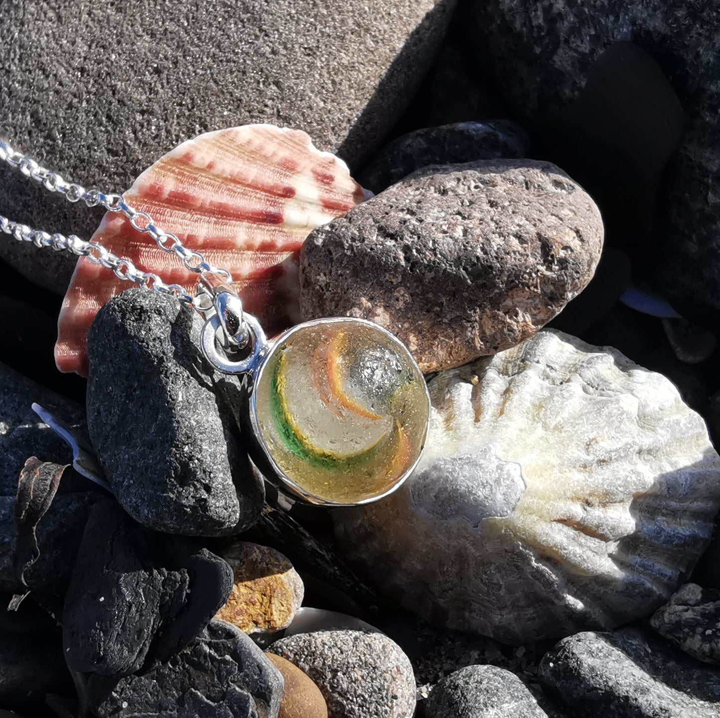 Hand made German sea glass marble & sterling silver pendant.