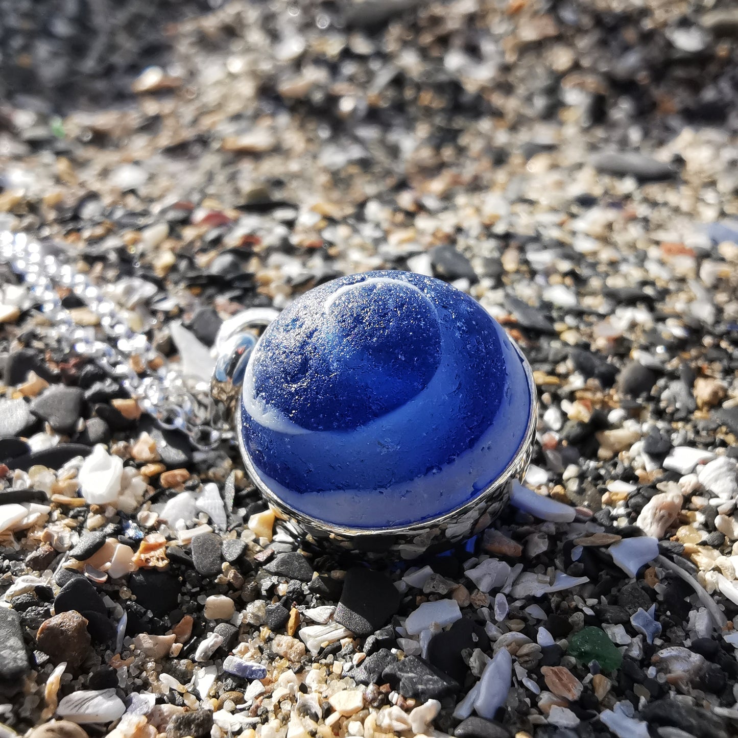 Scottish cobalt blue and white sea glass marble & sterling silver pendant.