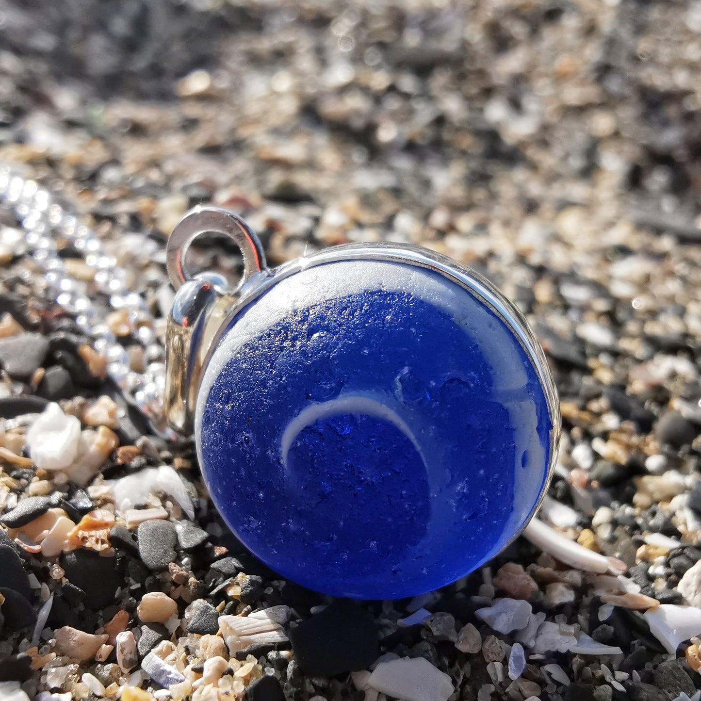 Scottish cobalt blue and white sea glass marble & sterling silver pendant.