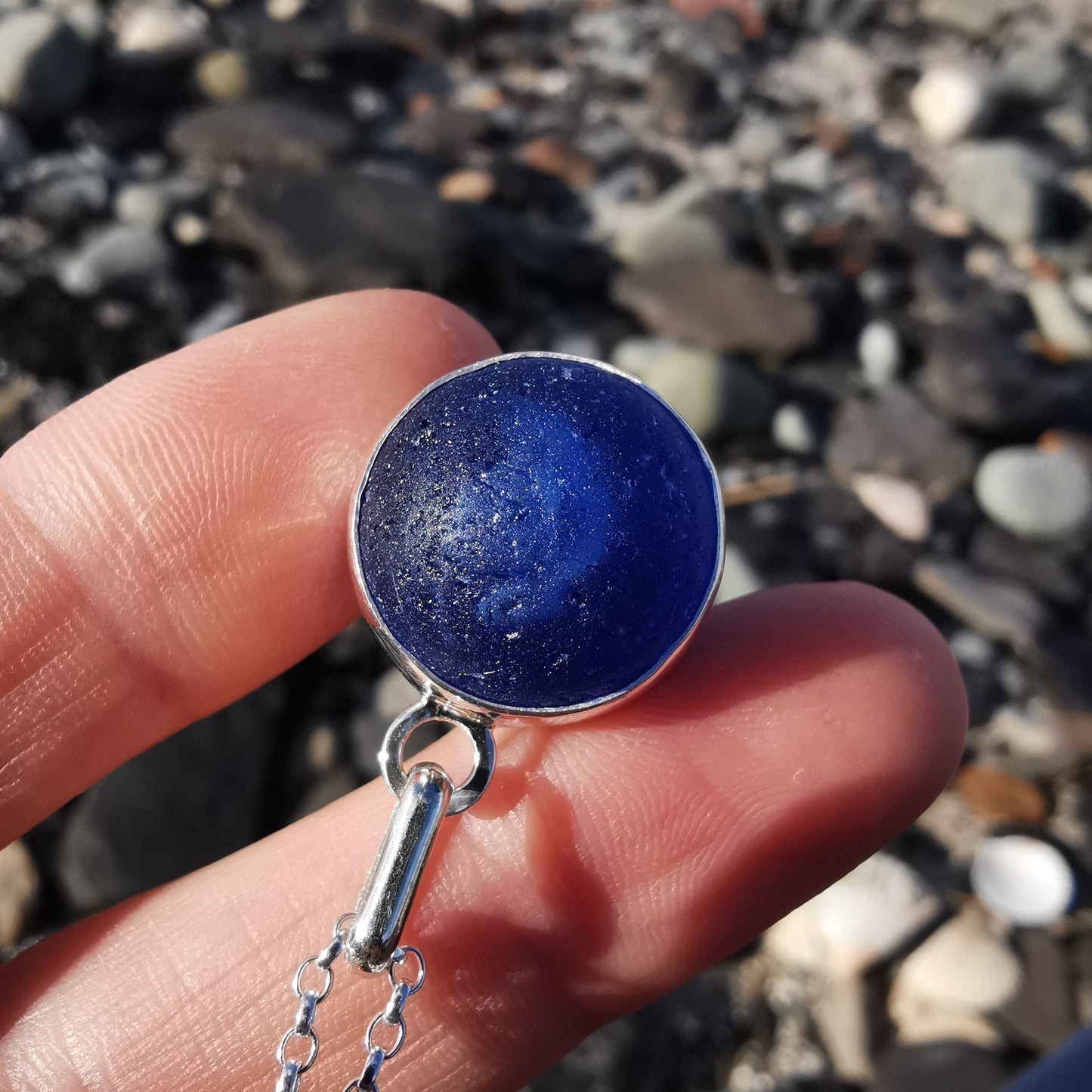 Scottish cobalt blue and white sea glass marble & sterling silver pendant.