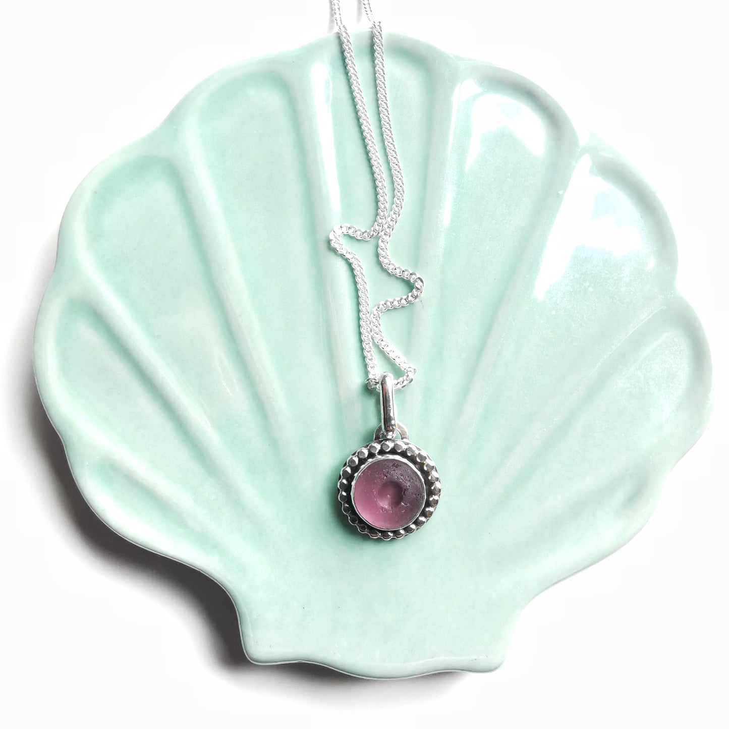 Tiny Scottish purple sea glass button & sterling silver pendant.